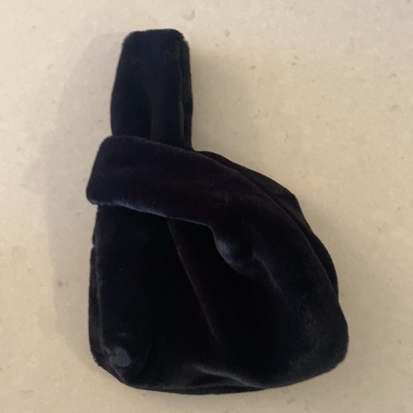 Faux fur black wristlet styled in multiple ways. - Picture 2 of 2